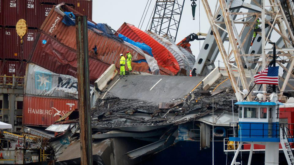demolition to remove part of baltimore’s key bridge to free trapped ship postponed until monday due to inclement weather