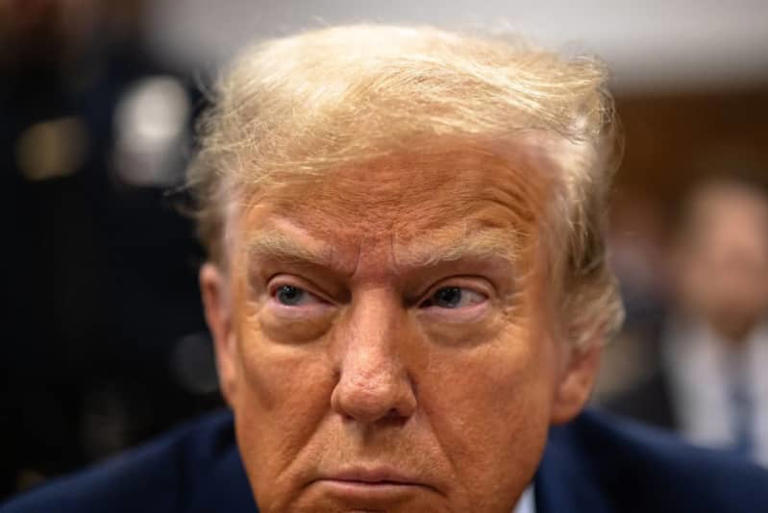  Former U.S. President Donald Trump sits in the courtroom during his hush money trial at Manhattan criminal court on April 26, 2024 in New York City. (Photo by Michael M. Santiago/Getty Images) 