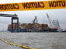 Demolition to remove part of Baltimore’s Key Bridge to free trapped ship postponed until Monday due to inclement weather<br><br>
