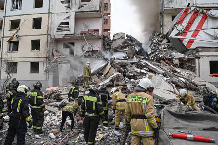 Apartment building partially collapses in a Russian border city after shelling. At least 13 killed<br><br>