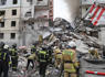Apartment building partially collapses in a Russian border city after shelling. At least 13 killed<br><br>