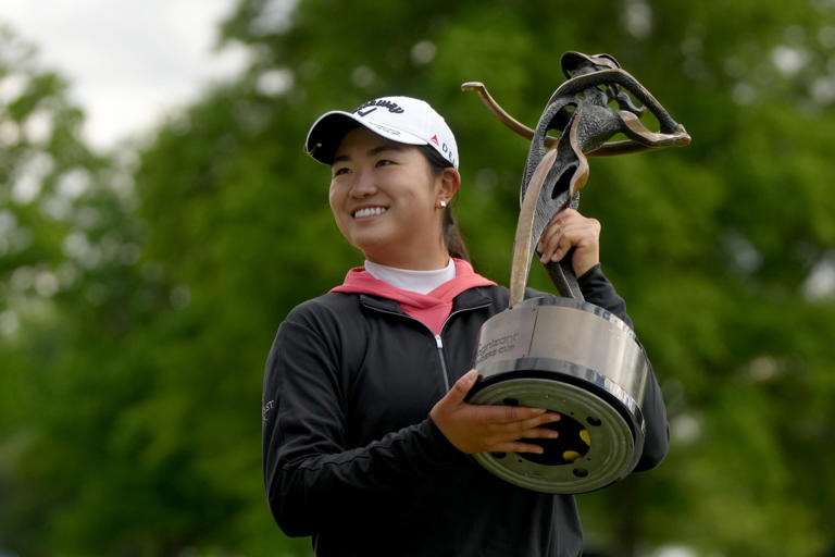 Rose Zhang poses with the trophy after winning the 2024 Cognizant Founders Cup at Upper Montclair Country Club. (Photo: Mike Stobe/Getty Images)