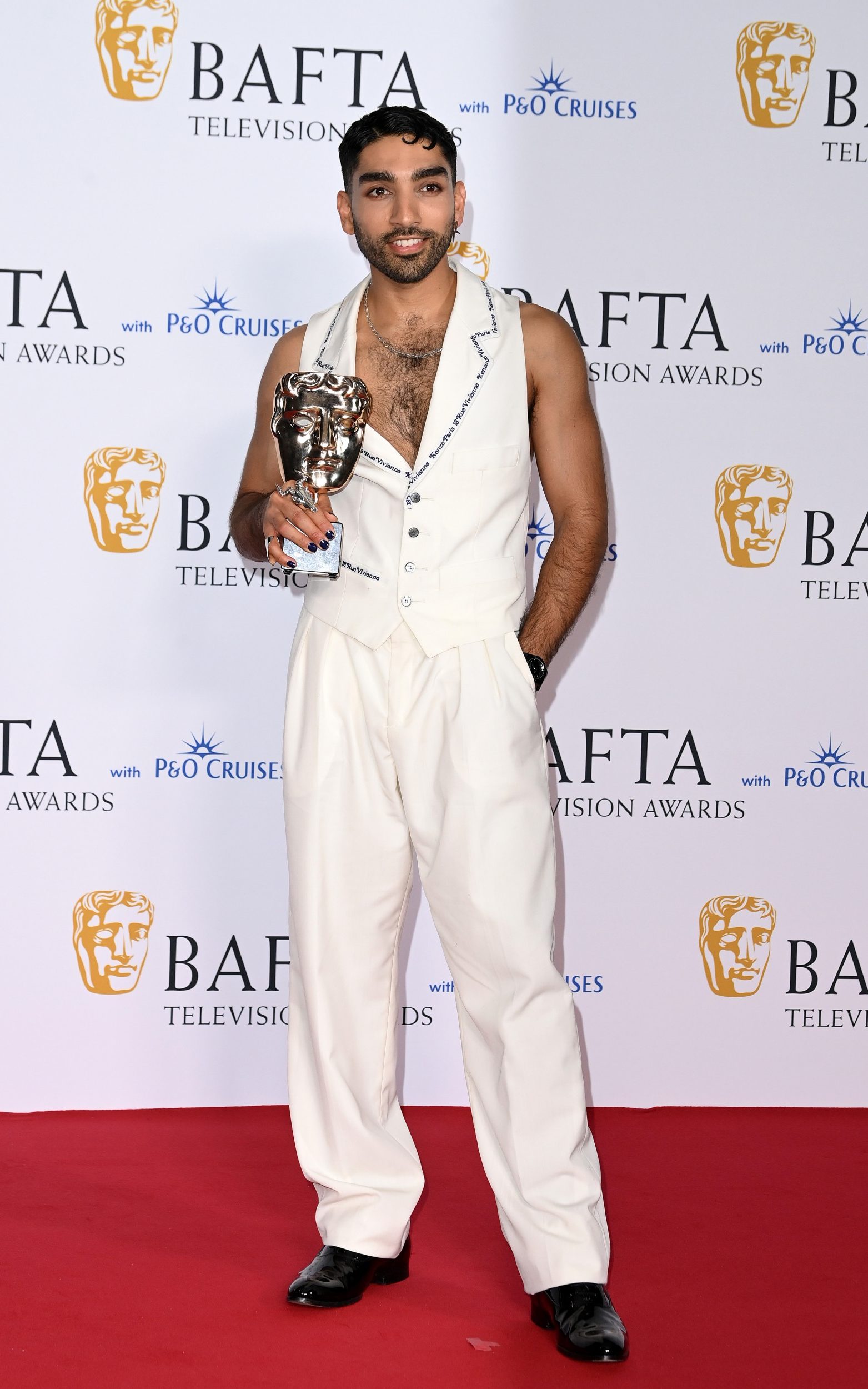 <p>Mawaan Rizwan, who won Best Male Performance in a Comedy for his role in Juice, sported a white waistcoat suit by Kenzo. </p>