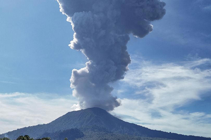 volcano warning: mount ibu erupts and thick ash fills sky - locals told not to go within three miles of crater
