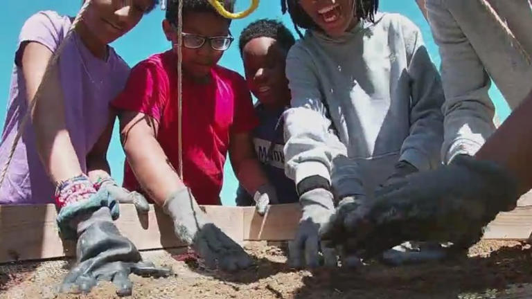 Students learn archaeology by digging up history at Swann Middle School in Greensboro