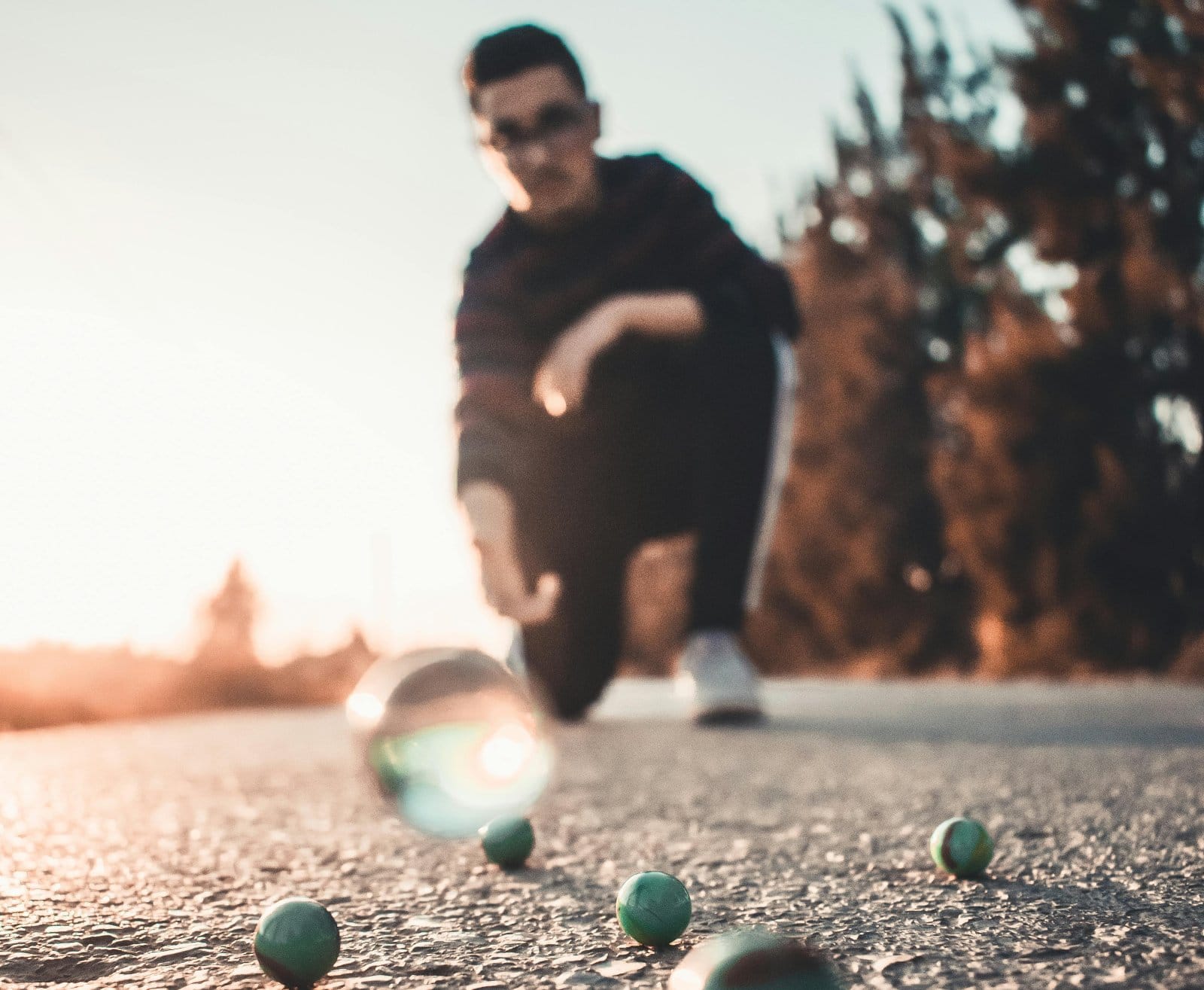Image Credit: Pexel / Nadjib ali Bachir <p><span>Playing marbles involves strategy, skill, and a bit of physics, providing a fun and educational way to discuss concepts like force and motion. It’s also a great way to foster patience and fine motor skills.</span></p>