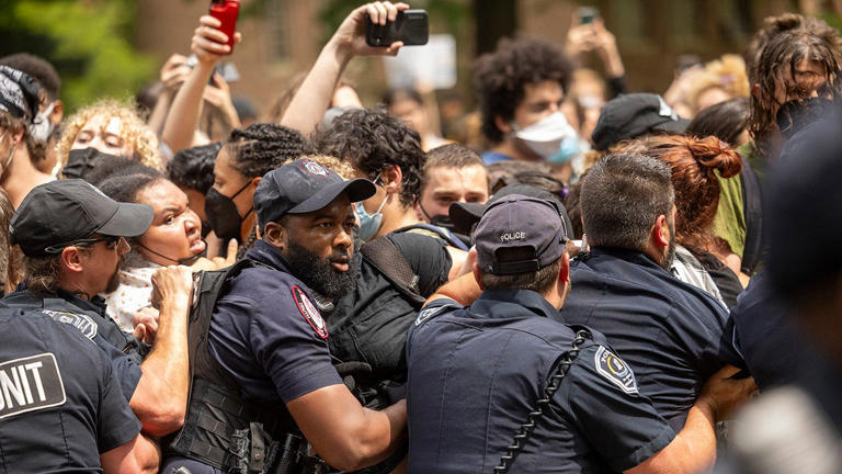 Anti-Israel demonstrators clash with police after replacing an American flag with a Palestinian flag, April 30, 2024, at UNC-Chapel Hill. Getty Images