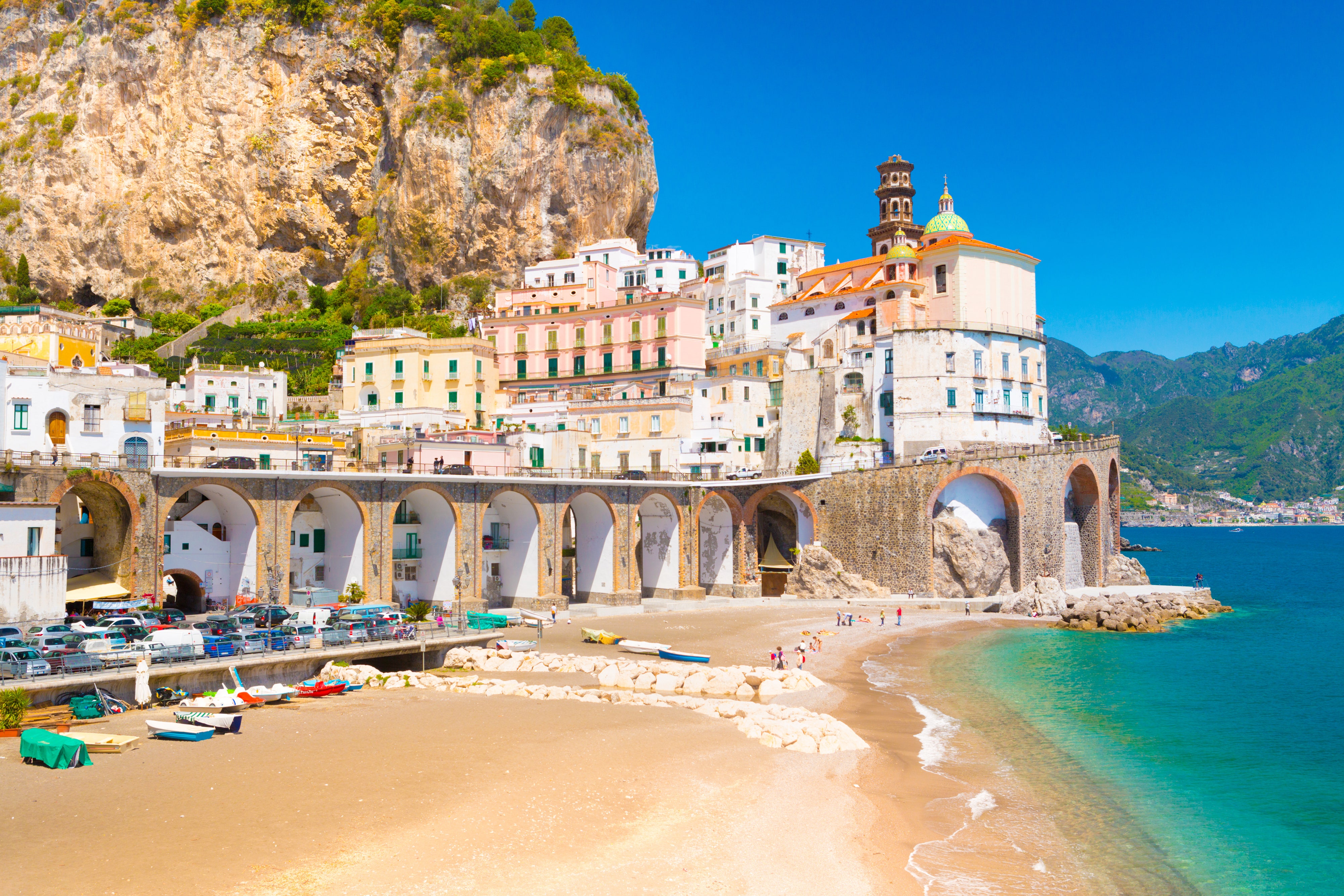 <p>Located along the <a href="https://www.cntraveler.com/story/timeless-allure-amalfi-coast?mbid=synd_msn_rss&utm_source=msn&utm_medium=syndication">Amalfi Coast</a>, small picturesque Atrani is reminiscent of Italy's most famous coastal hot spots (think Positano, Capri, et al.)—just much less crowded. Aside from its beautiful churches, lively piazzas, and colorful cliffside perch in the province of Salerno, Atrani has a pale-sand beach flush against the Tyrrhenian Sea.</p> <p>Get here by bus or ferry from <a href="https://www.cntraveler.com/gallery/best-hotels-in-naples?mbid=synd_msn_rss&utm_source=msn&utm_medium=syndication">Naples</a>; both are two hour trips that end in with a stunning reward: The views of the water bookended by two cliffs are hard to beat. In need of a spot to bed down? Book the <a href="https://www.cntraveler.com/hotels/italy/nh-collection-grand-hotel-convento-di-amalfi?mbid=synd_msn_rss&utm_source=msn&utm_medium=syndication">Anantara Convento di Amalfi Grand Hotel</a>, situated in a former monastery, and you’ll be treated to a truly religious experience.</p><p>Sign up to receive the latest news, expert tips, and inspiration on all things travel</p><a href="https://www.cntraveler.com/newsletter/the-daily?sourceCode=msnsend">Inspire Me</a>