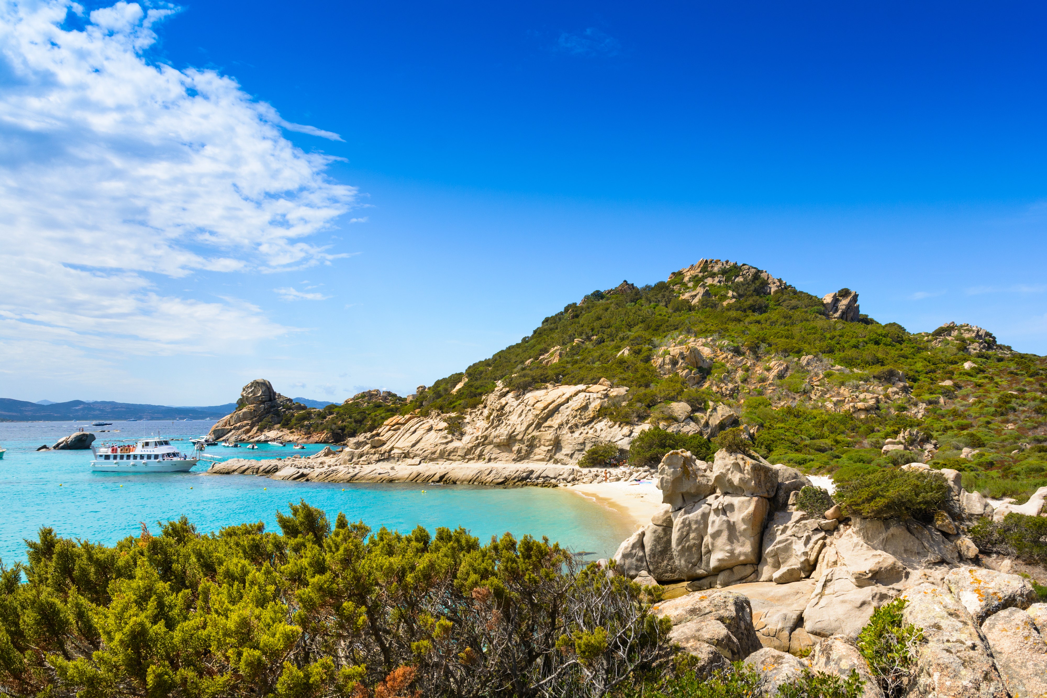 <p>Located in the Maddalena Archipelago between Sardinia and the <a href="https://www.cntraveler.com/destinations/france?mbid=synd_msn_rss&utm_source=msn&utm_medium=syndication">French</a> island of Corsica, Isola Spargi’s coastline could almost be mistaken for tropical <a href="https://www.cntraveler.com/story/in-tahiti-the-ancient-polynesian-style-of-way-finding-is-making-a-comeback?mbid=synd_msn_rss&utm_source=msn&utm_medium=syndication">Tahiti</a>. The beaches here are not flanked by dramatic cliffs like in most other coastal areas in Italy; instead, they are backed by palm trees and lush island plants. The shallow turquoise waters are perfect for snorkeling and the silvery sand is made for all-day sunbathing.</p> <p>The best months to swim in the waters of Isola Spargi are <a href="https://www.cntraveler.com/gallery/best-places-to-travel-august?mbid=synd_msn_rss&utm_source=msn&utm_medium=syndication">August</a> and <a href="https://www.cntraveler.com/gallery/best-places-to-travel-september?mbid=synd_msn_rss&utm_source=msn&utm_medium=syndication">September</a>, when the sea is at its warmest. To get here, you’ll need to take private or rented boats from Costa Smeralda, Santa Teresa Gallura, or Palau (the <em>comune</em> on the northern tip of Sardinia, not to be confused with <a href="https://www.cntraveler.com/story/palau-conservation-tourism?mbid=synd_msn_rss&utm_source=msn&utm_medium=syndication">the fascinating Pacific nation</a>). Also, there are no accommodations on the island, so nab a room at <a href="https://cna.st/affiliate-link/21YXcjY98V7uPbwpGnbqQLetz4GStuvN8uXkxBo4s3LZmJjFtm7Yy6FpkAQKBBgHpeVHfKqbu5boqRzCA1LhfzXi6Uw7krw7U6b5CmYGoxa58KEGyY4wxDsfV8qAAX7Zq7DdxbPKPhvo8FG1VWEugpFc3jo9ErCHggGts1QvzG8B1JsbQiFP45GzaiLRmN1C8rHkYhZ2F4QNNiUUSUujMkt" rel="sponsored">Grand Hotel Resort Ma&Ma</a> in nearby La Maddalena.</p><p>Sign up to receive the latest news, expert tips, and inspiration on all things travel</p><a href="https://www.cntraveler.com/newsletter/the-daily?sourceCode=msnsend">Inspire Me</a>