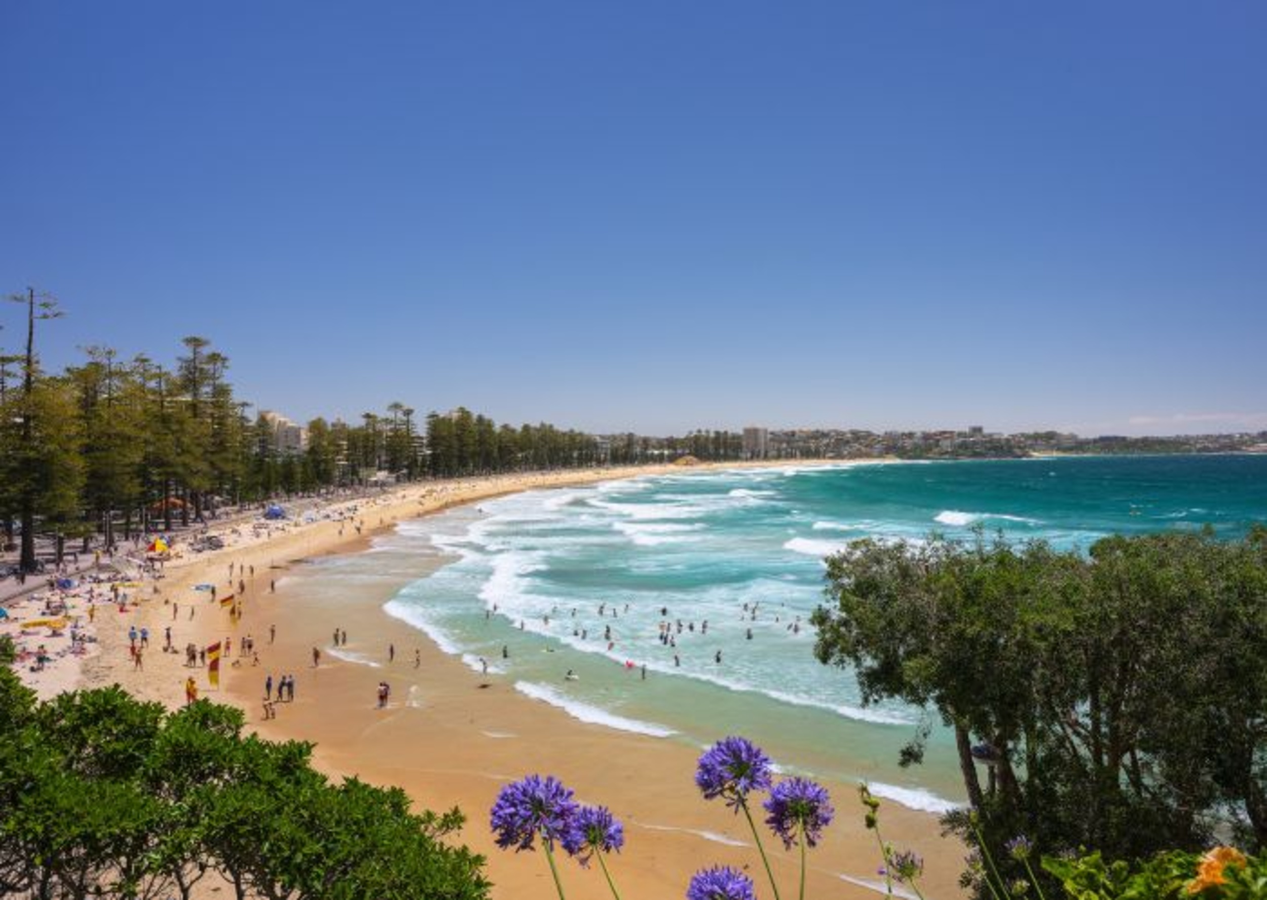 <p>Most people will tell you to visit Manly Beach after Bondi for a more relaxing sun bathing experience. There are far fewer people, but the beach is still busy with locals and tourists alike. Walk to the other side of the island from where the ferry drops you off, then find a spot in the sand to relax. It's that simple! </p><p>You may also like: <a href='https://www.yardbarker.com/lifestyle/articles/how_to_make_awesome_versions_of_your_favorite_junk_foods_at_home/s1__24359122'>How to make awesome versions of your favorite junk foods at home</a></p>