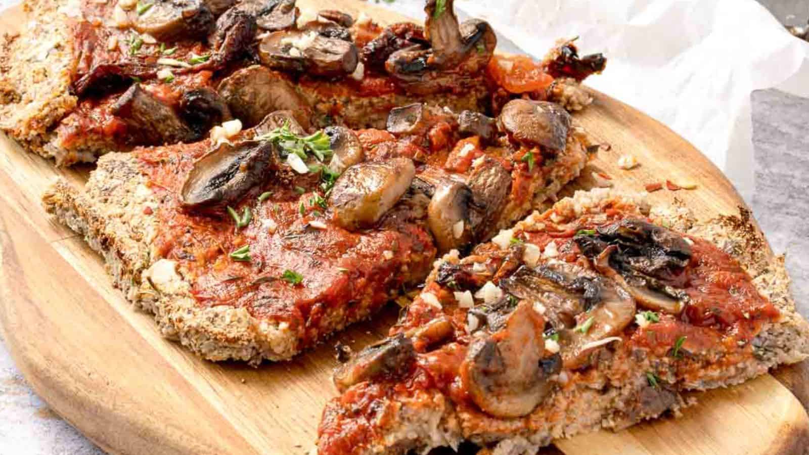 <p>Dive into our Vegan Cauliflower Pizza Crust topped with garlicky mushrooms and tomatoes for a low-carb indulgence. This pizza is not only delicious but also serves as a healthy alternative to traditional pizza crusts. It's crispy, satisfying, and packed with flavor. Making this pizza is as fun as eating it.<br><strong>Get the Recipe: </strong><a href="https://twocityvegans.com/easy-vegan-cauliflower-pizza-crust-recipe/?utm_source=msn&utm_medium=page&utm_campaign=">Vegan Cauliflower Pizza Crust with Garlicky Mushroom & Tomato Topping</a></p>