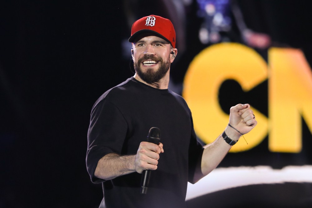 In Sam Hunt's latest track "Locked Up," the official music video is reminiscent of Johnny Cash's 1968 performance at Folsom Prison. Co-written with Zach Crowell, Jerry Flowers, Shane McAnally, and Josh Osborne, the song reflects on a brief jail stint and expresses gratitude to his wife, Hannah Lee Fowler, for her support. The video, filmed at Brushy Mountain State Penitentiary, features Hunt's band and Fowler. Hunt will perform "Locked Up" at the 2024 CMT Music Awards. He is currently on his "Outskirts Tour 2024," connecting with fans and enjoying life on the road with his band and crew.