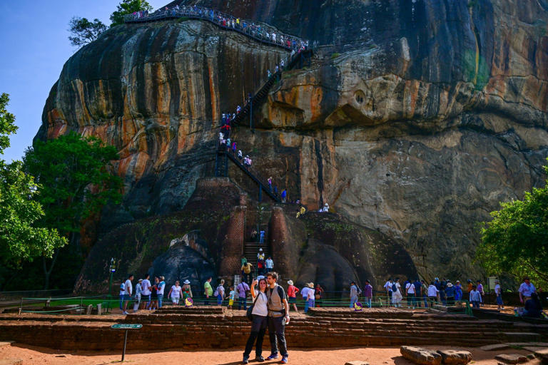 The ancient rock fortress of Sigiriya is one of Sri Lanka's many breathtaking heritage sites - Ishara S Kodikara/AFP