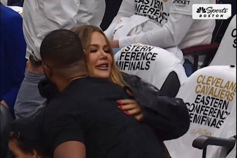 Khloe shared a hug with Tristan at the NBA game