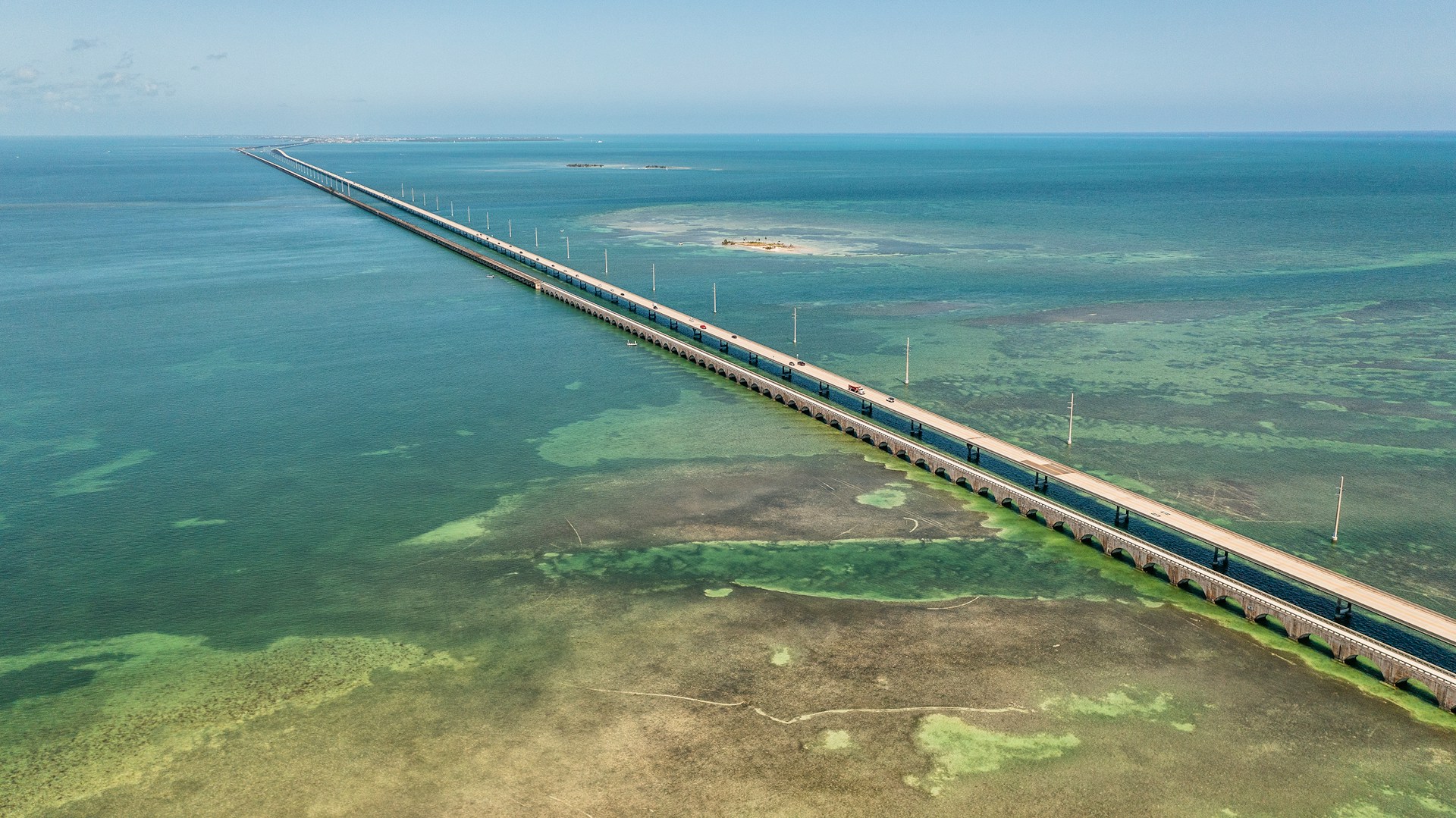 <p><strong><em>113 miles, 1 day</em></strong></p>  <p>U.S. 1 in the Florida Keys is a splendidly scenic drive, also called the Overseas Highway. The road is lined with beaches and small man-made bridges, each taking you through what looks like paradise.</p>  <p>To initiate your journey, start with Key Largo, called the "Diving Capital of the World '' and known for its vivid coral reefs for exploration. Take a road trip through the <a href="https://en.wikipedia.org/wiki/Seven_Mile_Bridge" rel="noreferrer noopener">Seven Mile Bridge</a>, the Pinnacle of Engineering, and enjoy tasty seafood in Marathon.</p>  <p>Go touring in Bahia Honda State Park, and then go towards Key West, where you can walk through Duval Street and visit the famous house of Ernest Hemingway. </p>  <p class="feed-msn-follow"><strong><a href="https://www.msn.com/en-us/channel/source/FamilyProof/sr-vid-j8xufcjxru9fdvjb0sa9xwsdtip7e52uxingspnca77dvqsbvnka" rel="noreferrer noopener">Follow us on MSN to see more exclusive content.</a></strong></p>