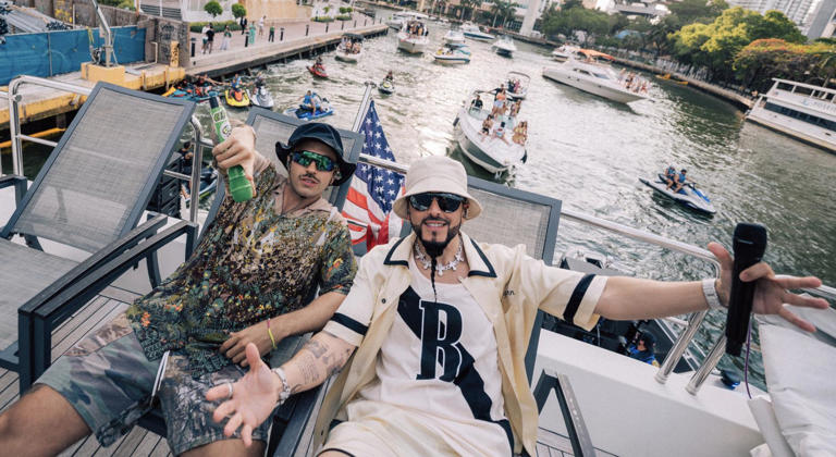 Feid and Yandel in a boat hang out in Miami