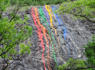 Rainbow paint vandalism on Beaucatcher Mountain rock face under investigation<br><br>