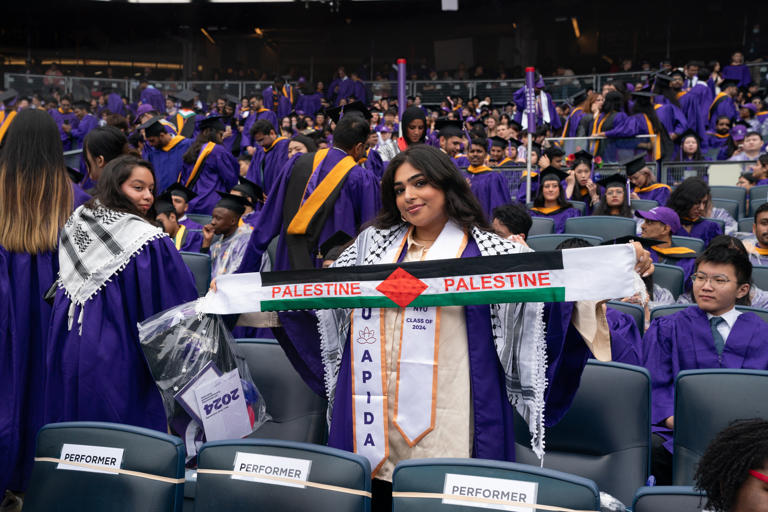 Pro-Palestinian students walk out as NYP President Linda Mills start speaking at NYU’ s All-University Commencement at Yankee Stadium Wednesday, May 15, 2024, in the Bronx, New York.