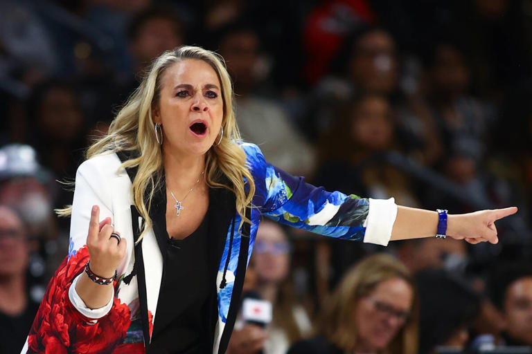 Las Vegas Aces head coach Becky Hammon shouts from the sideline during the first half of a WNBA basketball game against the Phoenix Mercury at Michelob ULTRA Arena on Tuesday, May 14, 2024, in Las Vegas.
