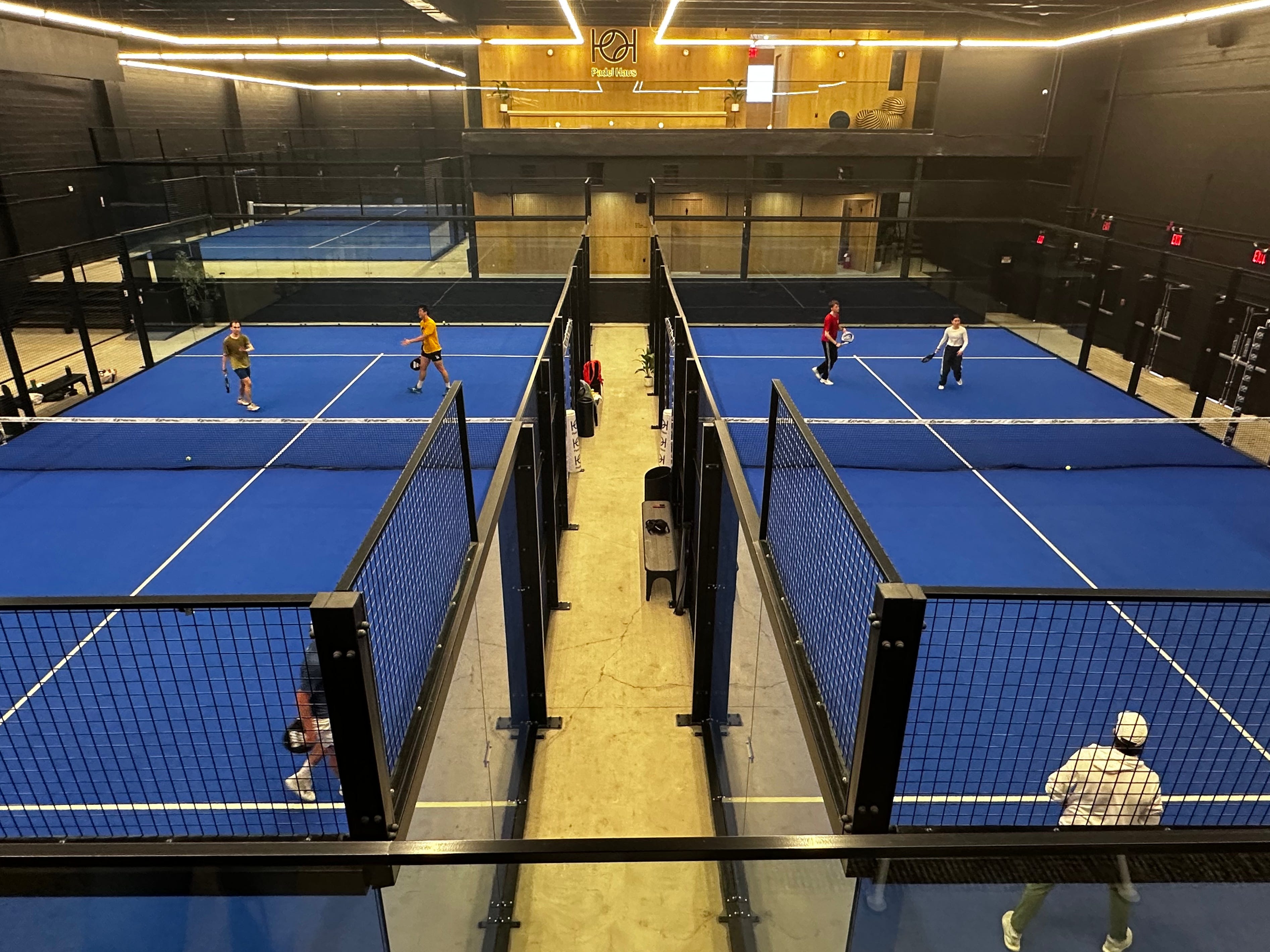 <p>Padel has the chattiness of pickleball and the intensity of tennis. In fact, the court is essentially a smaller tennis court.</p><p>The main thing that sets it apart from other racket sports is the glass casing required to play. During a game, players can hit the ball after it bounces off a glass wall.</p><p>That makes it hard for your local park to erect padel courts. Still, it's less of a stretch for the wealthy, who can install glass walls and artificial turf on their sprawling estates — or pay for pricey memberships to exclusive clubs (a single-club membership at Padel Haus, including an initiation fee, costs upwards of $2,000 a year, for example.)</p>