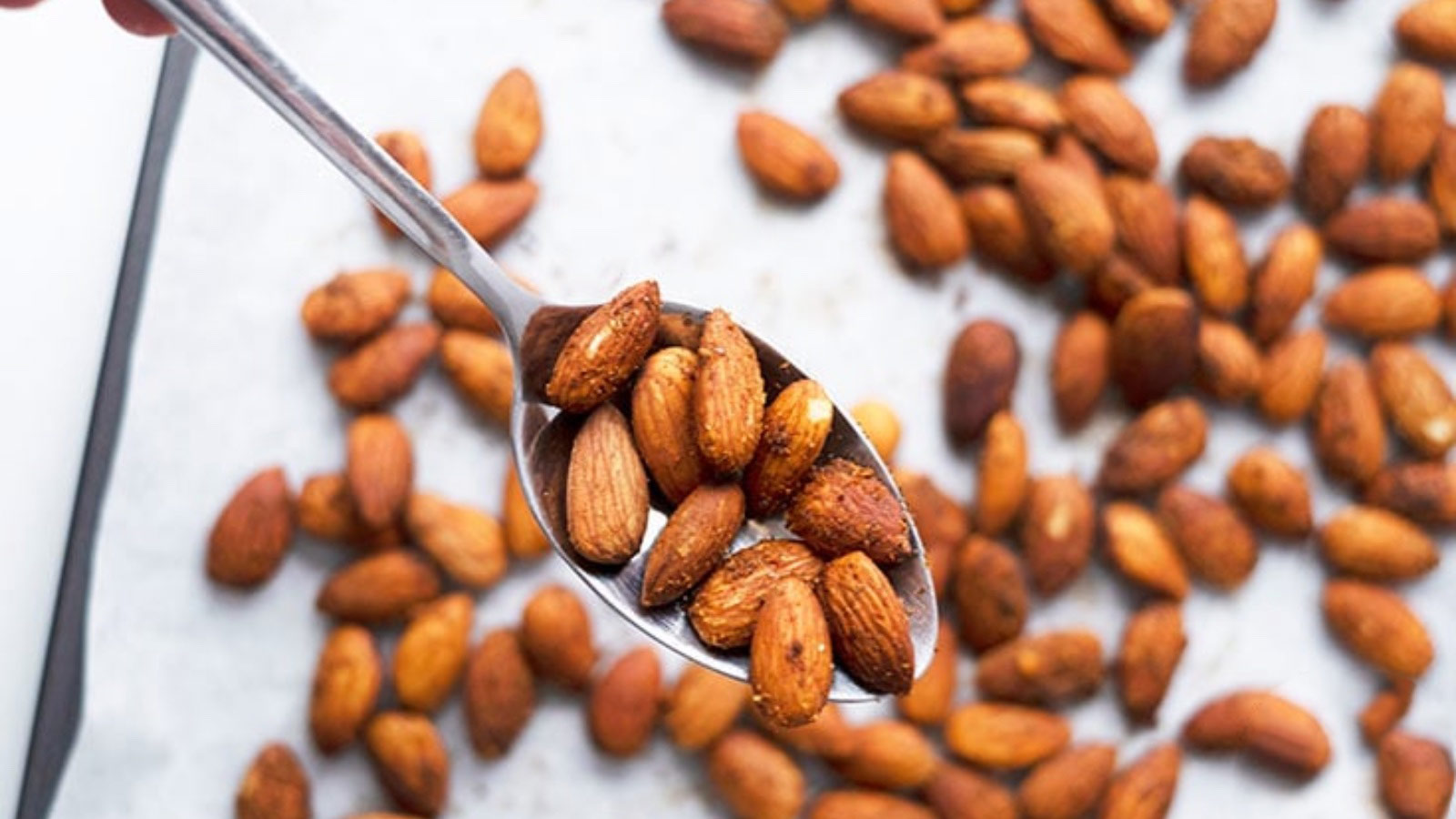 <p>These <a href="https://www.thegraciouspantry.com/clean-eating-spicy-roasted-almonds/">spicy roasted almonds</a> are a delicious protein-packed snack that you can just grab and go. They are easy to make with raw almonds and spices that you already have in your pantry. These almonds are good to eat with no refrigeration for two weeks; if you keep them in the fridge, they can be stored for up to one year. </p>