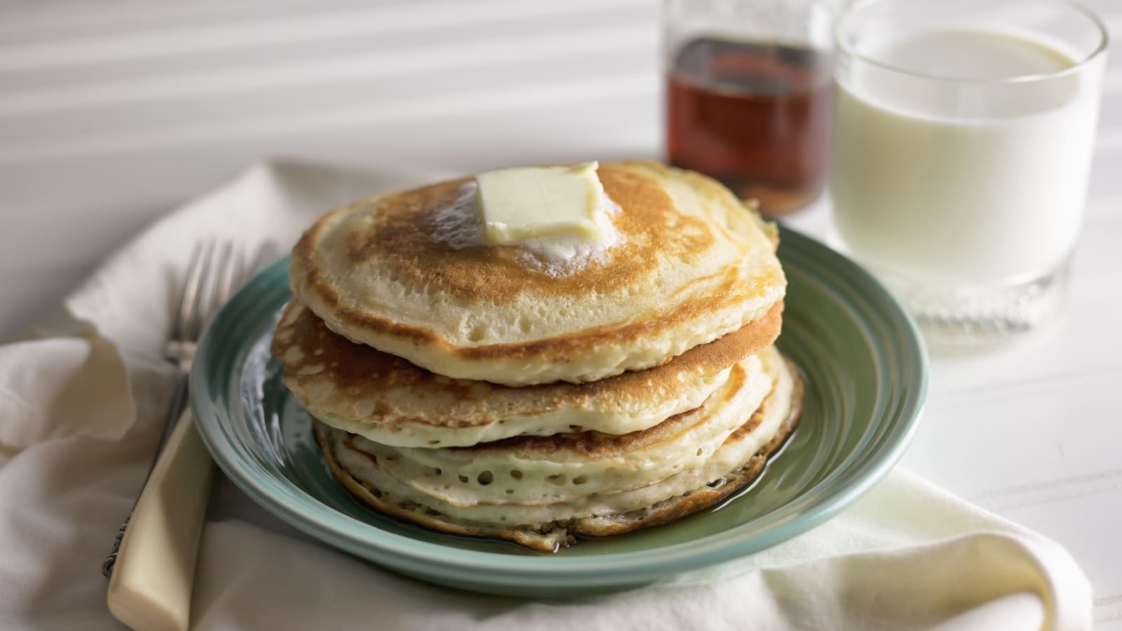 <p>This phrase refers to pancakes, syrup, and milk. It likely originated as playful slang. You might have heard it in a diner.</p>