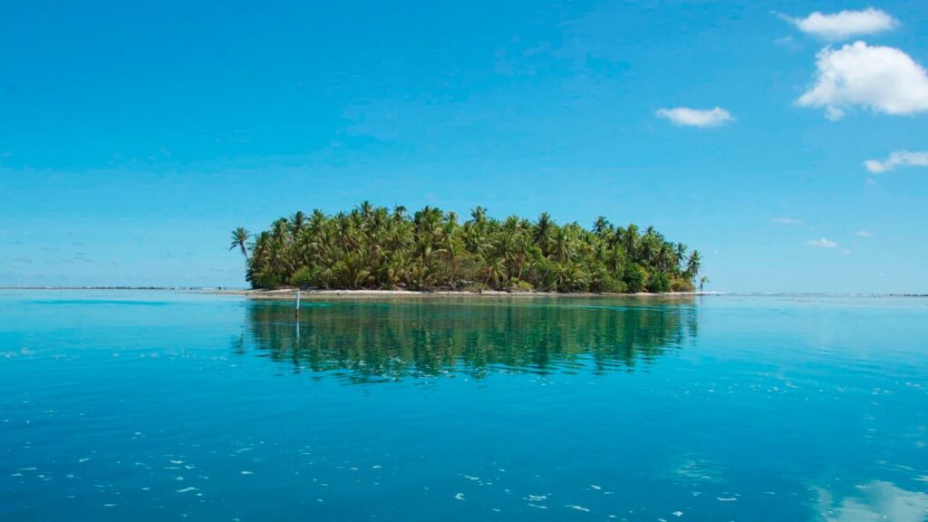 <p>Tokelau is a group of atolls in the South Pacific Ocean and a territory of New Zealand. It’s accessible only by boat, which makes it one of the most isolated spots on Earth.</p><p>The community lives a traditional Polynesian lifestyle, largely unaffected by modernity. Its pristine beaches and clear waters are almost untouched by tourism. In fact, visitors must be invited by locals, a practice which ensures a respectful and minimal-impact visit.</p>