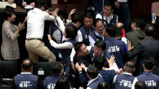 See chaotic brawl in Taiwan Parliament over chamber reforms<br><br>