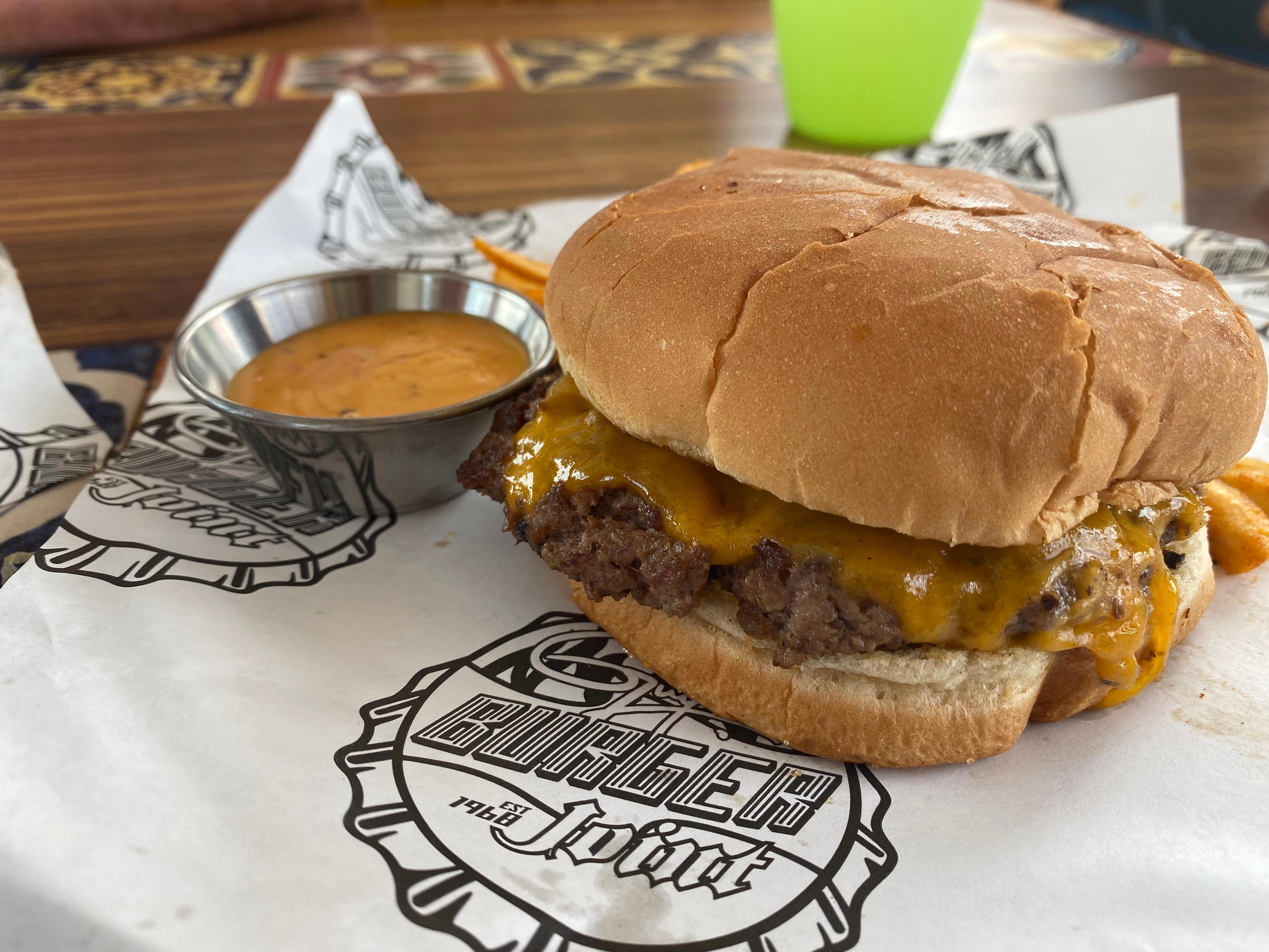 <p>The Plain Jane, a <a href="https://www.businessinsider.com/best-chain-hamburgers-according-to-chefs-2018-11">grilled patty on a bun</a>, was the item I heard ordered most frequently in line. I got mine with cheese, but it can also be ordered with just a patty as well. </p><p>It was a great option for kids who don't want a lot of extra dressing on their burgers. Personally, I wanted a bit more flavor, so I dipped the Plain Jane into some chipotle mayo.</p>