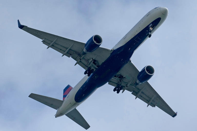 A Delta Airlines place flies in to land at Mitchell International Airport in Milwaukee on Wednesday, May 22, 2024.