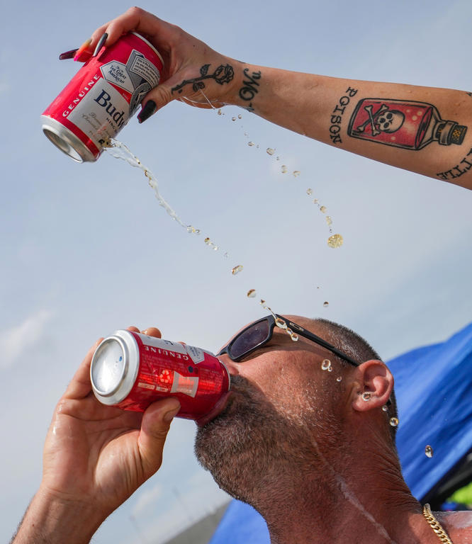 Beer, tattoos, and fast cars highlight Carb Day ahead of the 108th ...