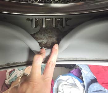 before photo of black staining on a reviewer's washing machine gasket