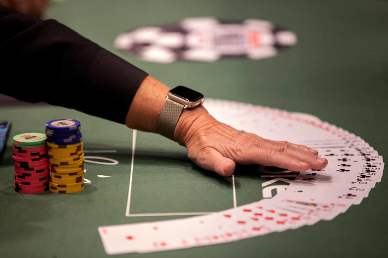 A dealer straightens their table during the first day of the World Series of Poker at Horseshoe Las Vegas on Tuesday, May 30, 2023, in Las Vegas. (Ellen Schmidt/Las Vegas Review-Journal) @ellenschmidttt