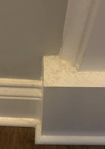 reviewer showing their dirty baseboards
