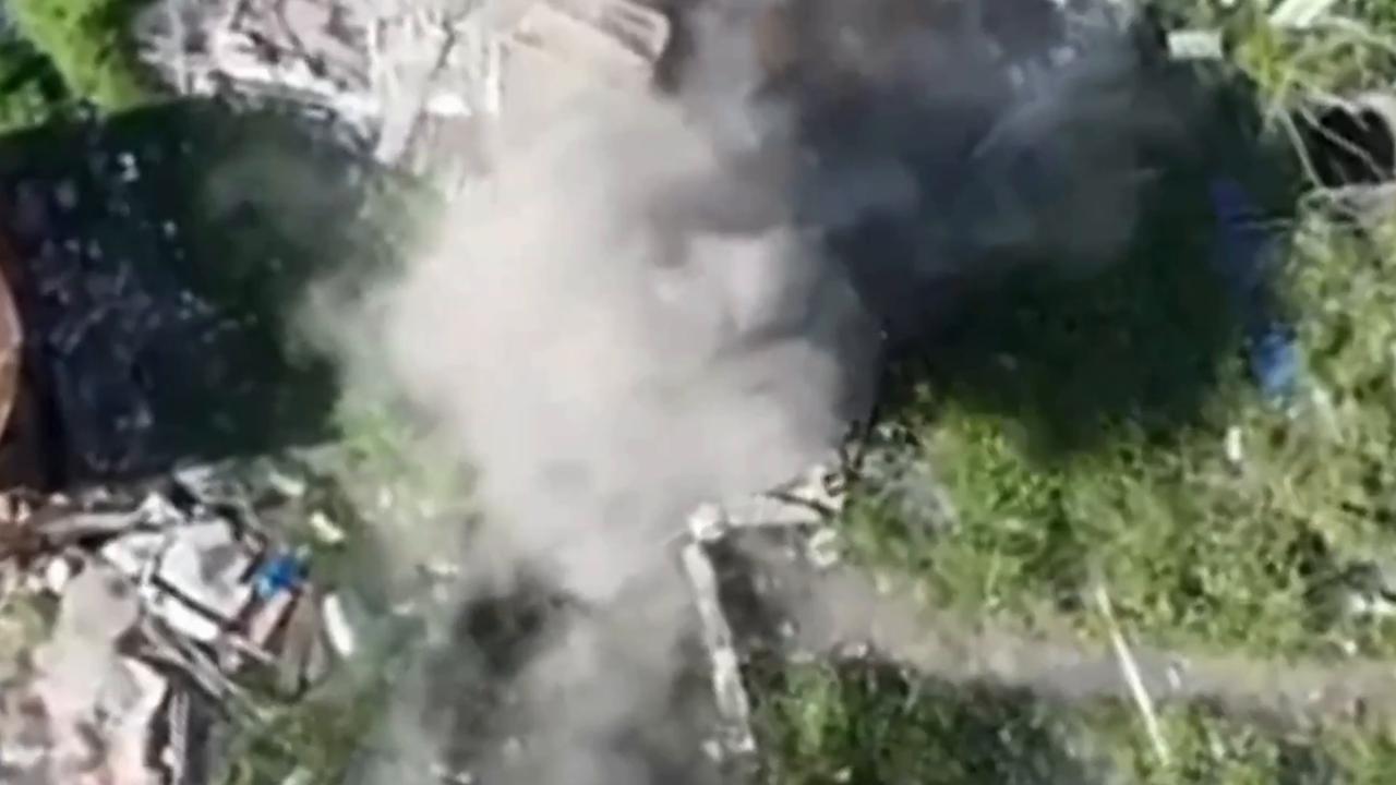 Ukrainian drones drop bombs on Russian soldiers hiding in damaged buildings