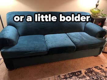 reviewer's blue stretch velvet couch cover on a large couch with text overlaid that reads