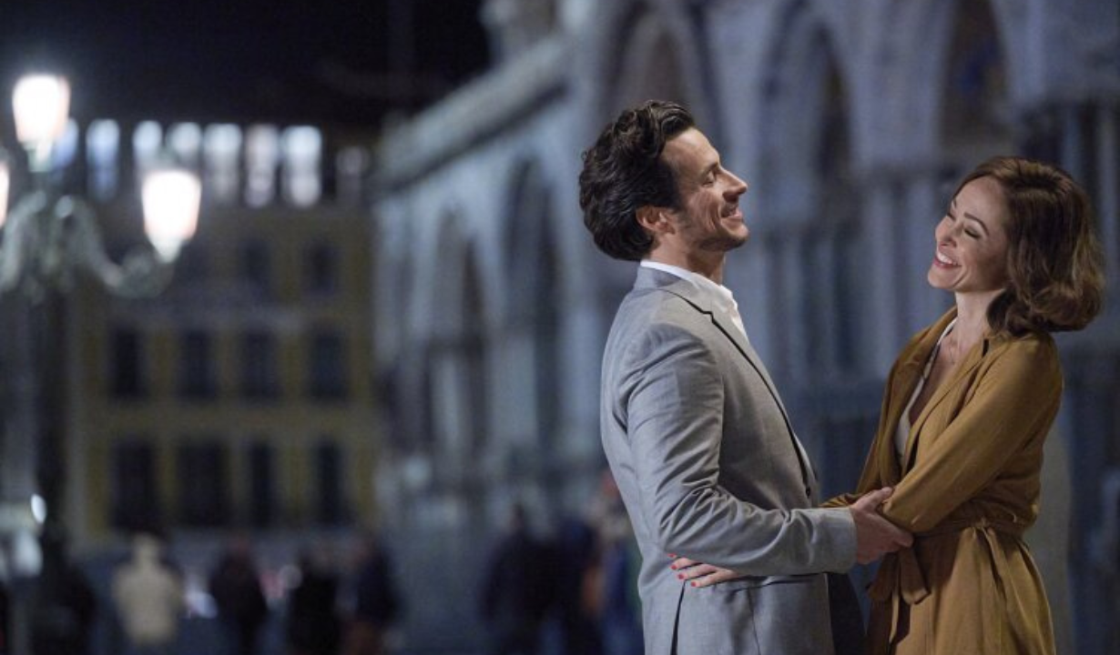 <p><em>The Wedding Veil Unveiled</em> is the second film in Hallmark’s <em>Wedding Veil</em> franchise. The film — which premiered on February 12, 2022 — sees Emma travel to Italy to teach and investigate a wedding veil said to bring its owner love. While there, she meets a local named Paolo, the son of a local lace-making family.</p>