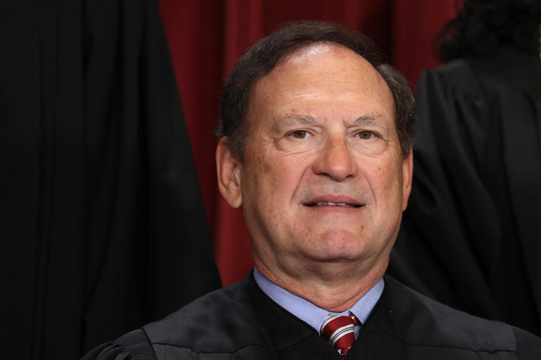 United States Supreme Court Associate Justice Samuel Alito poses for an official portrait at the East Conference Room of the Supreme Court building on October 7, 2022 in Washington, DC. The justice is currently under fire for two controversial flags displayed outside of his homes.