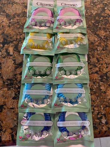 pack of ten differently colored wrist bands to deter mosquitos