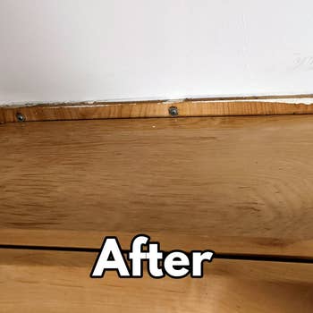 a reviewer photo of the same cabinet now clean and text reading