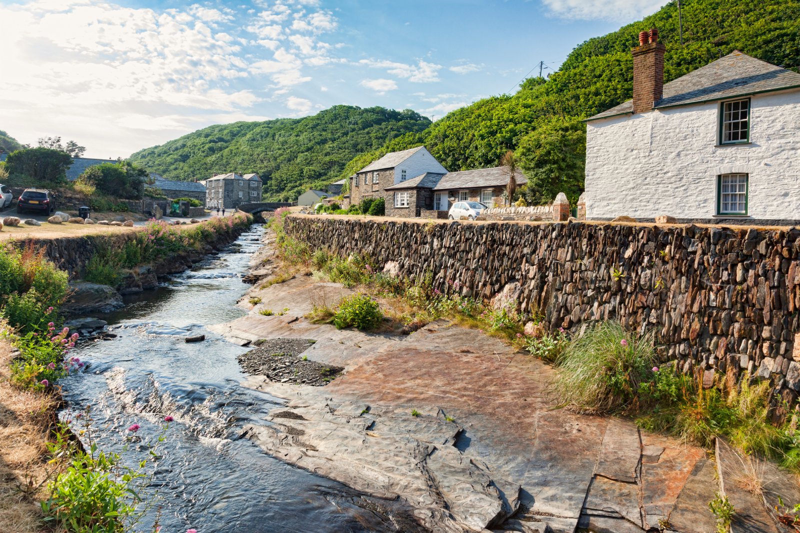 Image Credit: Shutterstock / travellight <p>Boscastle combines dramatic coastal scenery with a quaint harbour village atmosphere. Flooding history and narrow roads can make access challenging, but the coastal walks are worth the effort.</p>