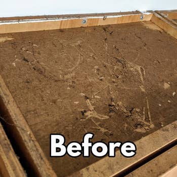 a reviewer photo of a cabinet top covered in a layer of grime and dust and text reading