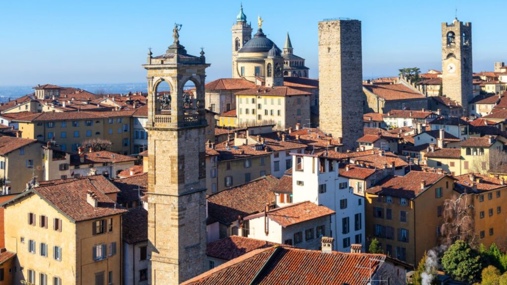 <p>Bergamo, a hilltop city in northern <a class="wpil_keyword_link" href="https://theboutiqueadventurer.com/famous-landmarks-in-italy/" rel="noopener" title="Italy">Italy</a>, is often overshadowed by its more famous neighbor, Milan. However, this hidden gem boasts a charming medieval Upper Town (Città Alta), a bustling Lower Town (Città Bassa), and stunning views of the surrounding Lombardy region.</p><p>Bergamo is significantly <a href="https://experienceeurope.eu/bergamo-the-city-i-fell-in-love-with/">cheaper</a> than Milan, with cost-effective accommodation, delicious local cuisine, and free attractions like the Piazza Vecchia and the Bergamo Cathedral. Riding the funicular up to Città Alta and wandering through its narrow streets and historic piazzas is a great way to spend an afternoon.</p>
