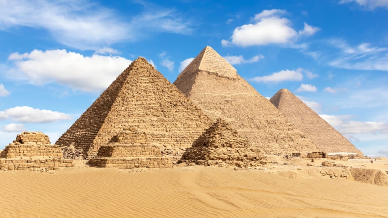 <p><strong>Age</strong>: Approximately 4,500 years old (2560 BC)<br><strong>Location</strong>: Giza, Egypt </p> <p>No list of the world’s oldest buildings would be complete without mentioning the Great Pyramid of Giza, the last surviving wonder of the ancient world. Built around 2560 BC for the Pharaoh Khufu, this incredible structure was the tallest man-made building on Earth for nearly 4,000 years.</p> <p>The Great Pyramid is a marvel of ancient engineering, with each of its 2.3 million limestone blocks weighing an average of 2.5 tons. The precision with which these blocks were cut and fitted together is still a mystery to modern architects, who marvel at the pyramid’s near-perfect alignment and its ability to withstand the ravages of time.</p>