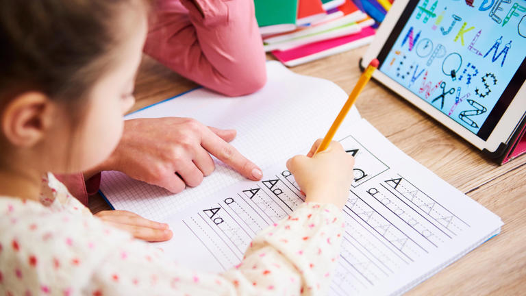 Policies and attitudes to homework vary across primary schools. (Adobe Stock)