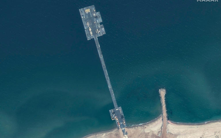 The new aid pier in Gaza, emplaced by the US military. It is also being used to try out new US anti-drone systems - Maxar Technologies/AP