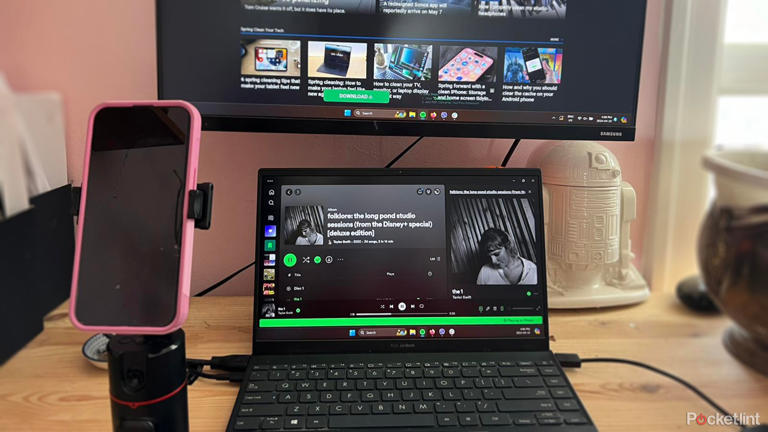 Afarer phone holder setup at desk with laptop