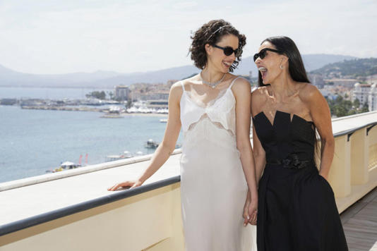 Margaret Qualley, left, and Demi Moore pose for photographers at the photo call for the film 'The Substance' at the 77th international film festival in Cannes Credit: Scott A Garfitt/2024 Invision