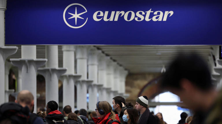 Passengers queue at the Eurostar departure gates at St Pancras in London last December