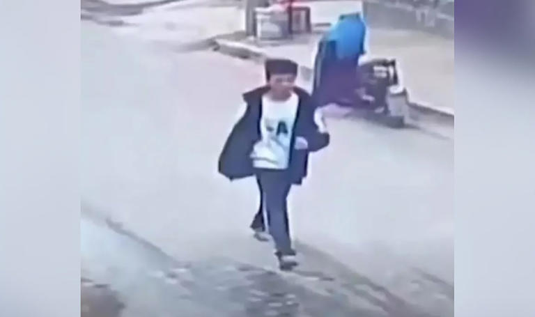 The 13 year-old victim, surnamed Wang, was seen on security video on March 10 before he was suspected murdered by three classmates, his body was later found in an abandoned vegetable shed. Photo: Weibo